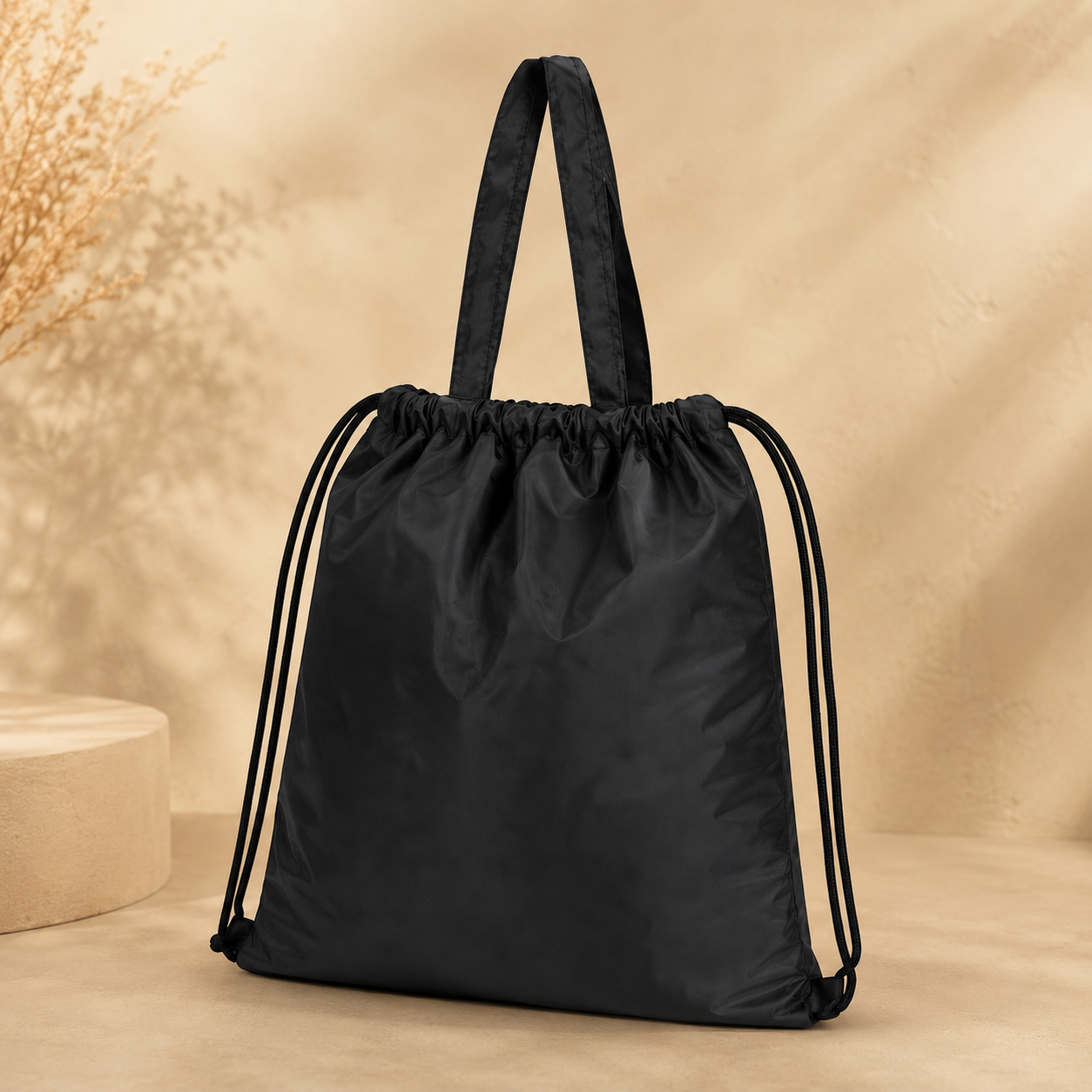 NYLON HAND BAG / DRAWSTRING BAG /  DUAL-FUNCTION CARRY AS OR TOTE OR DRAWSTRING BACKPACK / MADE FROM DURABLE , LIGHWEIGH NYLON / SPACIOUS INTERIOR FOR DAILY ESSENTIALS / IDEAL FOR WORK , TRAVEL , OR GIVEAWAYS BLACK image 3