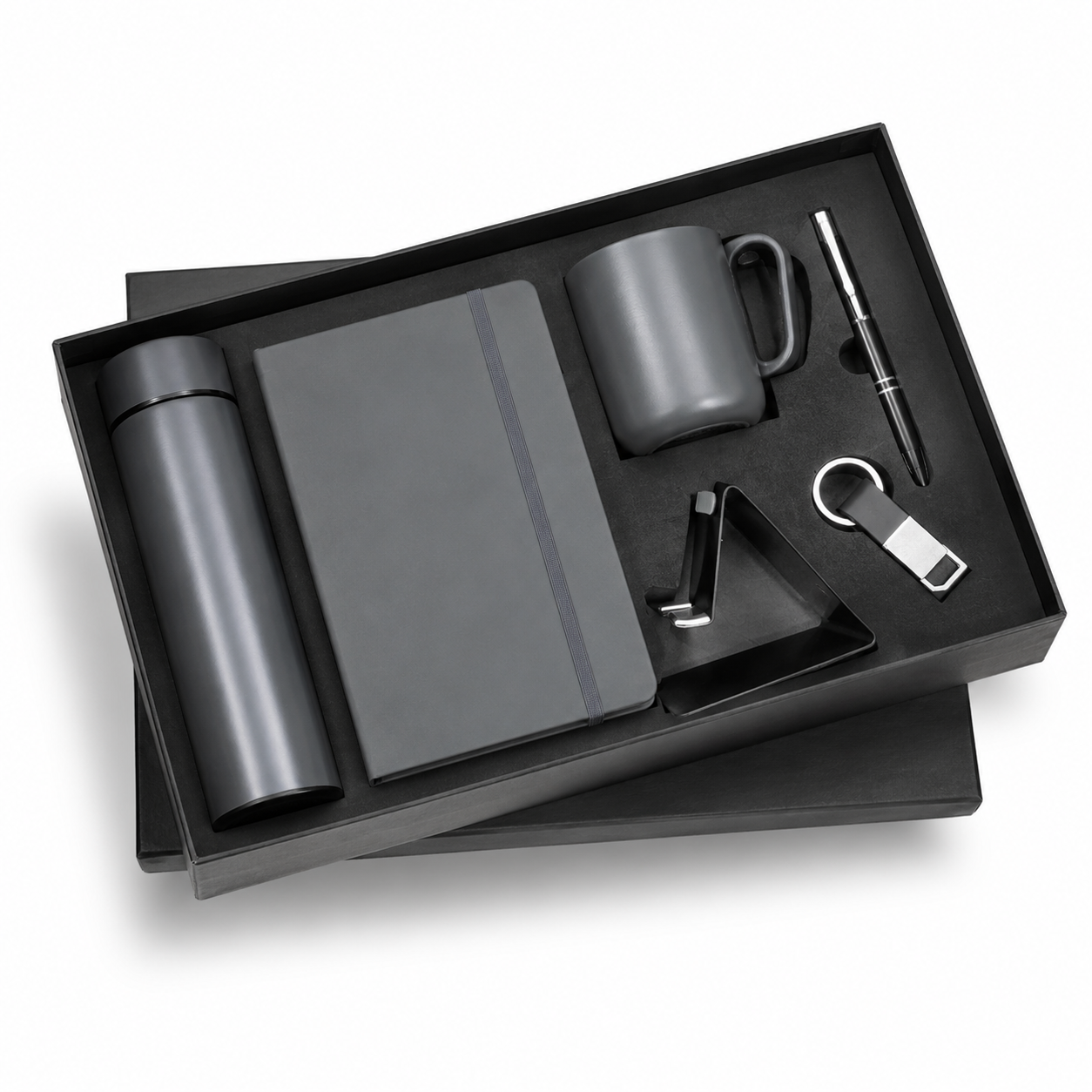 6 IN 1 BLACK A5 NOTEBOOK, TEMPERATURE BOTTLE, STEEL MUG, MOBILE STAND, PEN, & KEYCHAIN