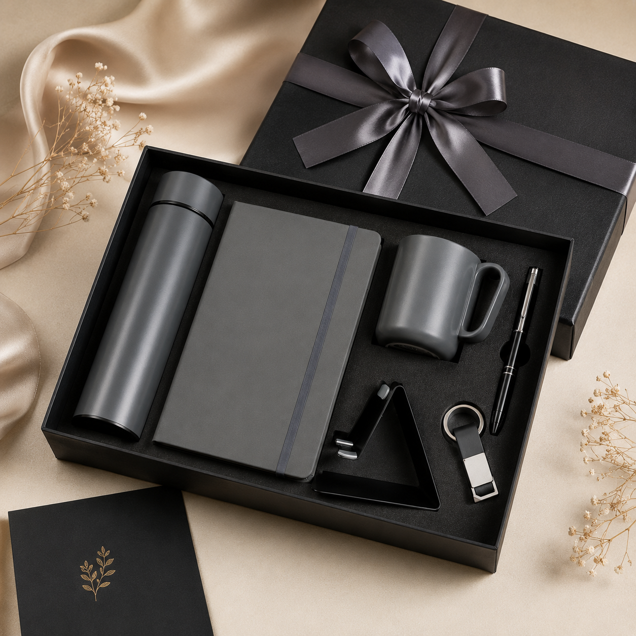 6 IN 1 BLACK A5 NOTEBOOK, TEMPERATURE BOTTLE, STEEL MUG, MOBILE STAND, PEN, & KEYCHAIN image 5